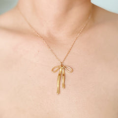 Elegant Bow Charm Necklace